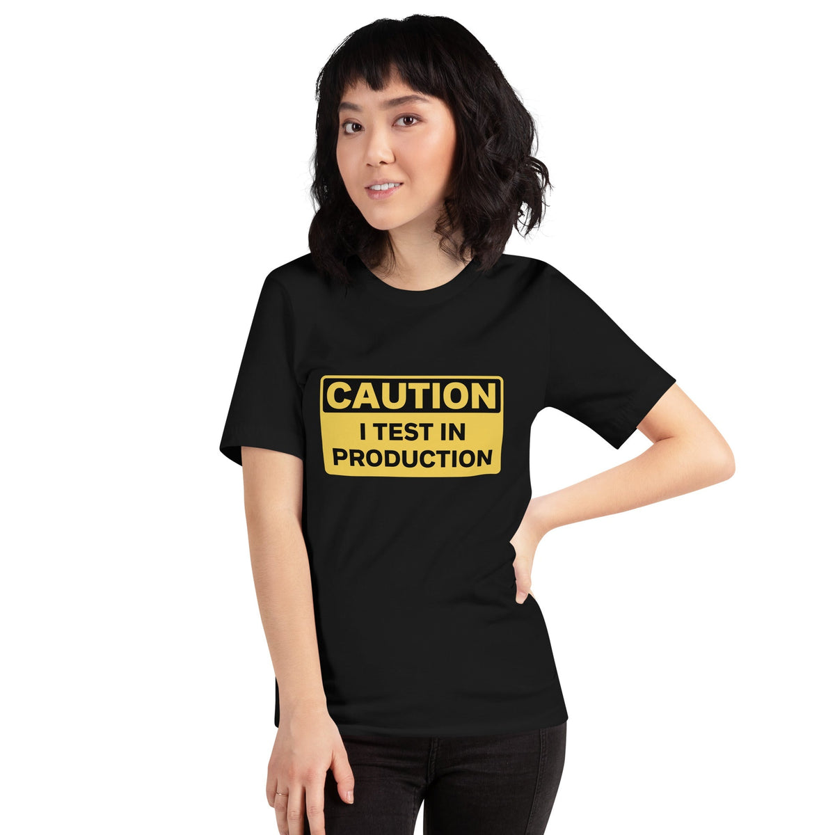 Product mockup photo of the CAUTION I Test in Production T Shirt (unisex).